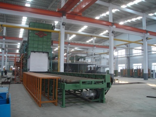 Back view of the furnace. Unloading unit for finished products.