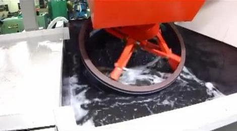 Move the basket to parts processing zone