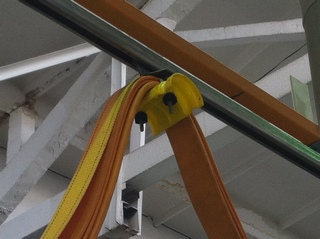 Support pulley for belts and cables